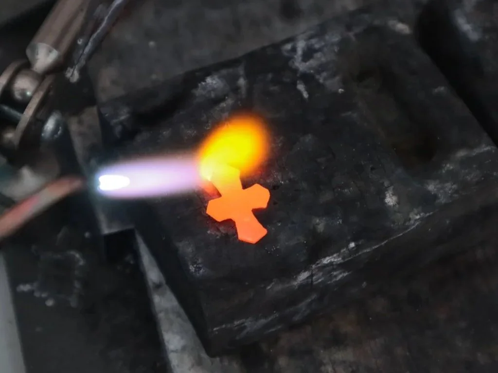 Design in progress 22 karat gold cross bespoke jewelry by Nelly Creative Studios NYC