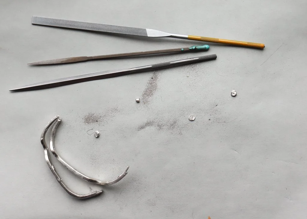 A piece in platinum in progress at Nelly Creative Studios New York City